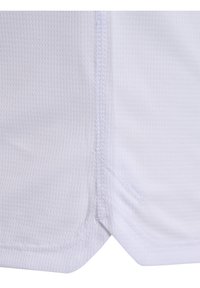 Witte sporttrui van een textuur met ademend materiaal. Voorzien van platte naden en een licht gebogen zoom voor een comfortabele pasvorm.