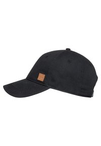 Black baseball cap made of cotton, featuring a curved visor, six-panel design, and a small brown leather patch on the front.
