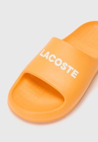 Lacoste Tohvelit - orange/white