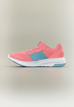 Pink New Balance running shoe with light blue logo and white sole on neutral background, side view showing laces and mesh details.