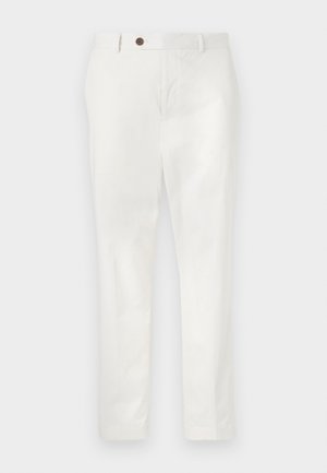 White pants made of lightweight fabric, featuring a straight-leg design, a single brown button at the waist, and minimalistic styling.