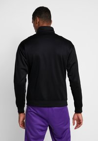 New Balance ATHLETICS CLASSIC TRACK JACKET - Trainingsvest - black