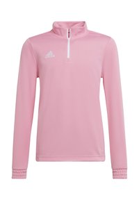 Roze sporttop met lange mouwen en een half-rits kraag. Heeft ribgebreide manchetten en een Adidas-logo op de bovenste linkerzijde. Gladde textuur.
