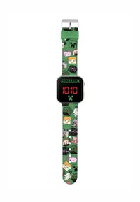 Orologio in silicone verde con quadrante quadrato nero che mostra numeri digitali rossi. Il cinturino presenta motivi pixelati di personaggi di Minecraft.
