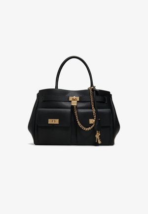 Black leather handbag with dual front pockets, gold-tone locks, a chain strap, and two small hanging key charms.