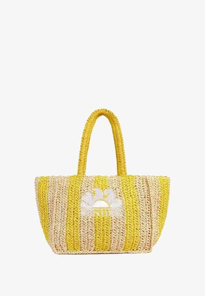Borsa tote in paglia intrecciata con strisce gialle e naturali, caratterizzata da un design floreale e logo. Finitura testurizzata con due manici robusti.