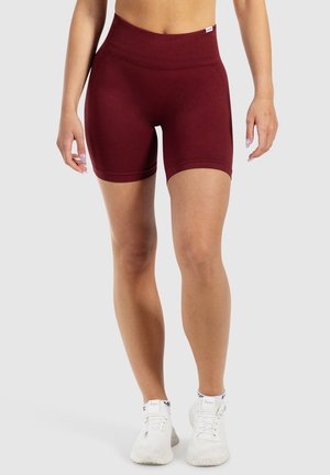 Burgunderrote, hoch taillierte Shorts aus weichem, dehnbarem Material. Verfügt über eine glatte Textur und ein figurbetontes Design, das sich für Sportbekleidung eignet.