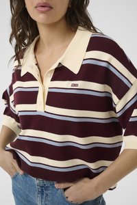 Striped polo shirt in maroon, cream, and light blue, featuring a pointed collar, short sleeves, and a small logo on the chest.