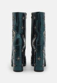 Koi Footwear DREAMS OF MOONCRAFT TEAL BOOTS - Gležnjače s platformom - teal