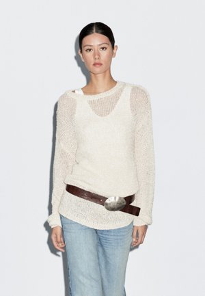 - Sweter