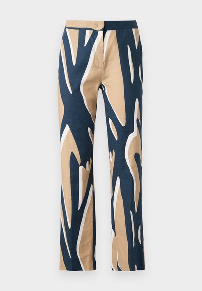 Wide-leg trousers in navy, beige, and white graphic pattern. Made from lightweight fabric with a smooth texture and tailored waist.