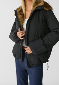 Stradivarius Vinterjakker - black