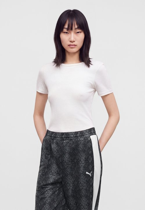 PUMA SNAKE STRAIGHT PANTS - Tracksuit bottoms - black — photo 4