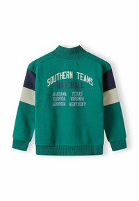 Felpa in cotone verde con colletto alto, caratterizzata dalla stampa "SOUTHERN TEAMS BASEBALL" e dai nomi degli stati in accenti blu navy e crema.