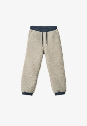 Mīksti biezi bikses gaisā beigē ar maigu tekstūru, ar tumši zilu elastīgu jostu un regulatoriem.