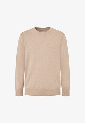 Suéter beige de punto, elaborado con una tela suave. Cuenta con un cuello redondo, mangas largas, puños acanalados y un pequeño logotipo en la manga izquierda.