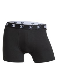 Czarne bokserki z miękkim pasem w talii z logo "CR7" w białym kolorze. Tkanina jest gładka i elastyczna, zapewniając dopasowanie.