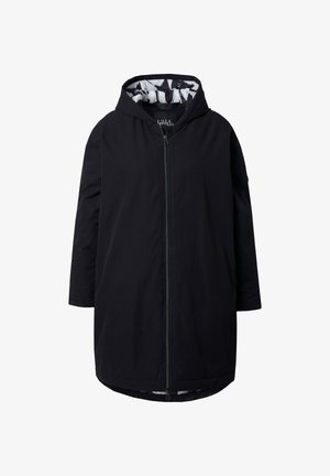 Zwarte capuchonjas met een ritssluiting aan de voorkant, lange mouwen en een contrasterende, patroonvoering aan de binnenkant. Heeft een ontspannen pasvorm en een ontwerp tot op de knie.