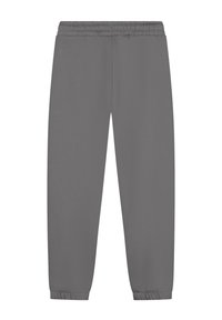 Grijze sweatpants met een elastische tailleband, taps toelopende boorden en een zachte textuur. Geen zichtbare zakken of patronen.