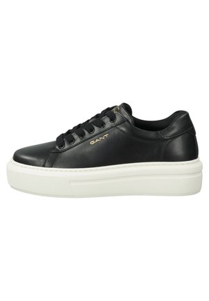 Black leather sneakers with a white rubber sole, rounded toe, lace-up design, and embossed logo on the side. Smooth texture, minimalist style.