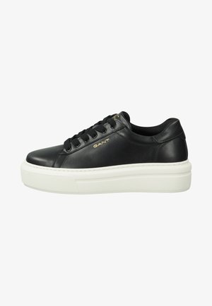 Black leather sneakers with a white rubber sole, rounded toe, lace-up design, and embossed logo on the side. Smooth texture, minimalist style.