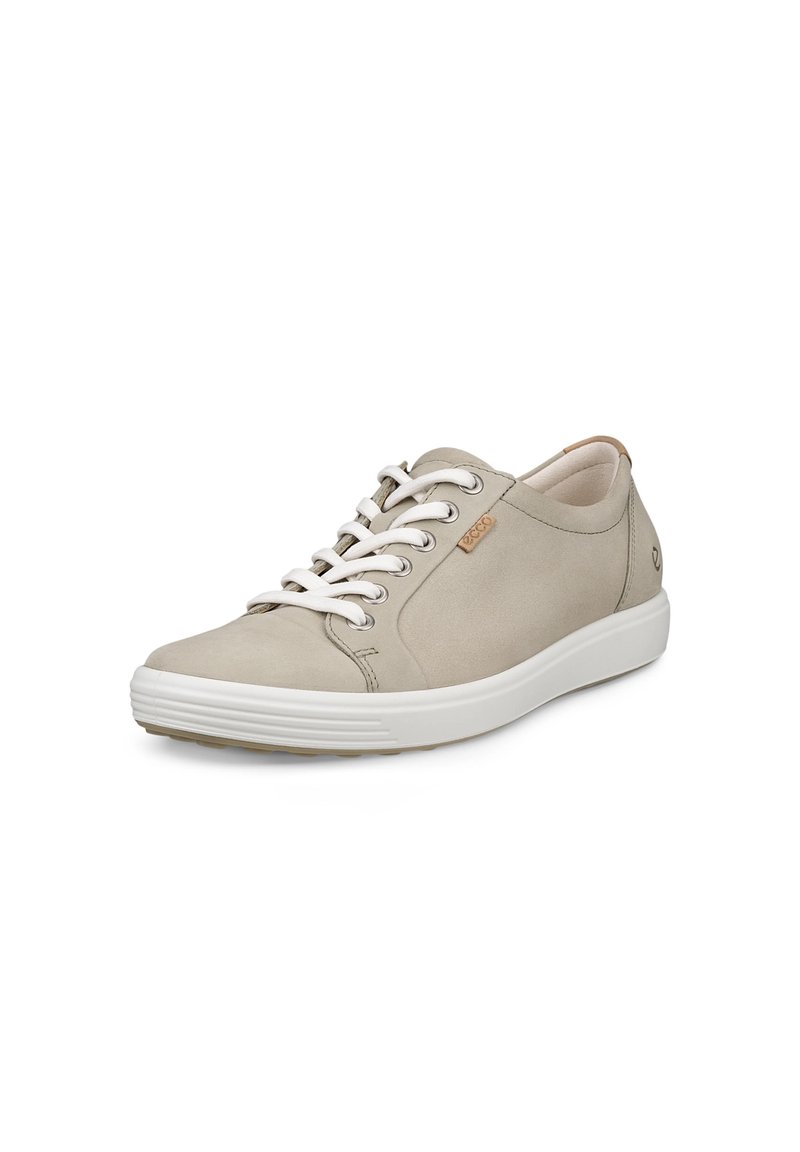 Helle beige Sneaker aus weichem Leder mit weißen Schnürsenkeln und einer Gummisohle. Verfügt über eine abgerundete Zehenpartie und dezente Nähte.