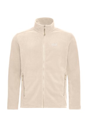 Veste en polaire beige avec un col montant, une fermeture éclair frontale et deux poches latérales zippées. Présente un petit logo sur la poitrine gauche.