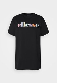 T-shirt en coton noir à manches courtes, avec un logo "ellesse" multicolore brodé sur le devant. Design simple à col rond.