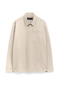 Camicia a maniche lunghe beige chiaro con colletto classico, taschino sul petto e tessuto leggermente strutturato. Polsini abbottonati e orlo dritto.