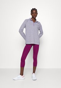 Nike Performance FAST CROP - Leggings - sangria/silver