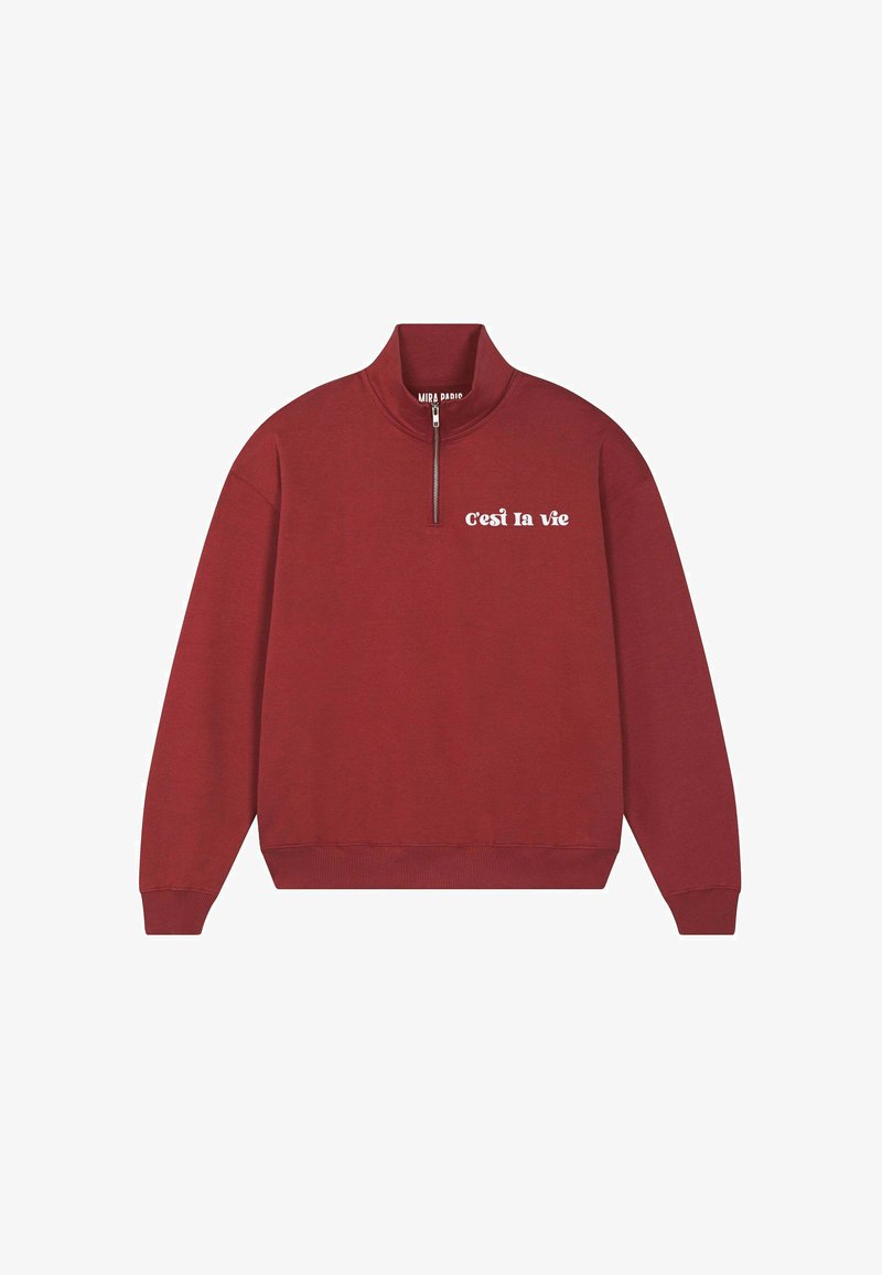 Felpa bordeaux con zip a quarto, polsini e orlo a coste, con la scritta bianca "c'est la vie" sul petto a sinistra.