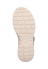 White shoe sole with textured grip pattern, featuring a raised grid design, smooth edges, and embossed brand and size markings.