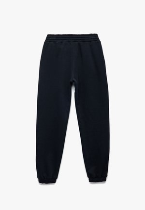 Chándal azul marino con cintura elástica y puños ajustados; hecho de una tela suave, con una textura lisa y sin patrones.