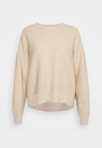 Beige gestrickter Pullover mit geripptem Saum und Bündchen, weiten Ärmeln und einer leicht verkürzten Silhouette. Weiche Textur und entspannte Passform.