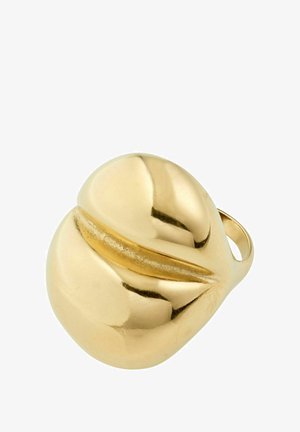 Smooth, shiny gold ring with an abstract, rounded double-lobed design and a central groove, photographed on a white background.