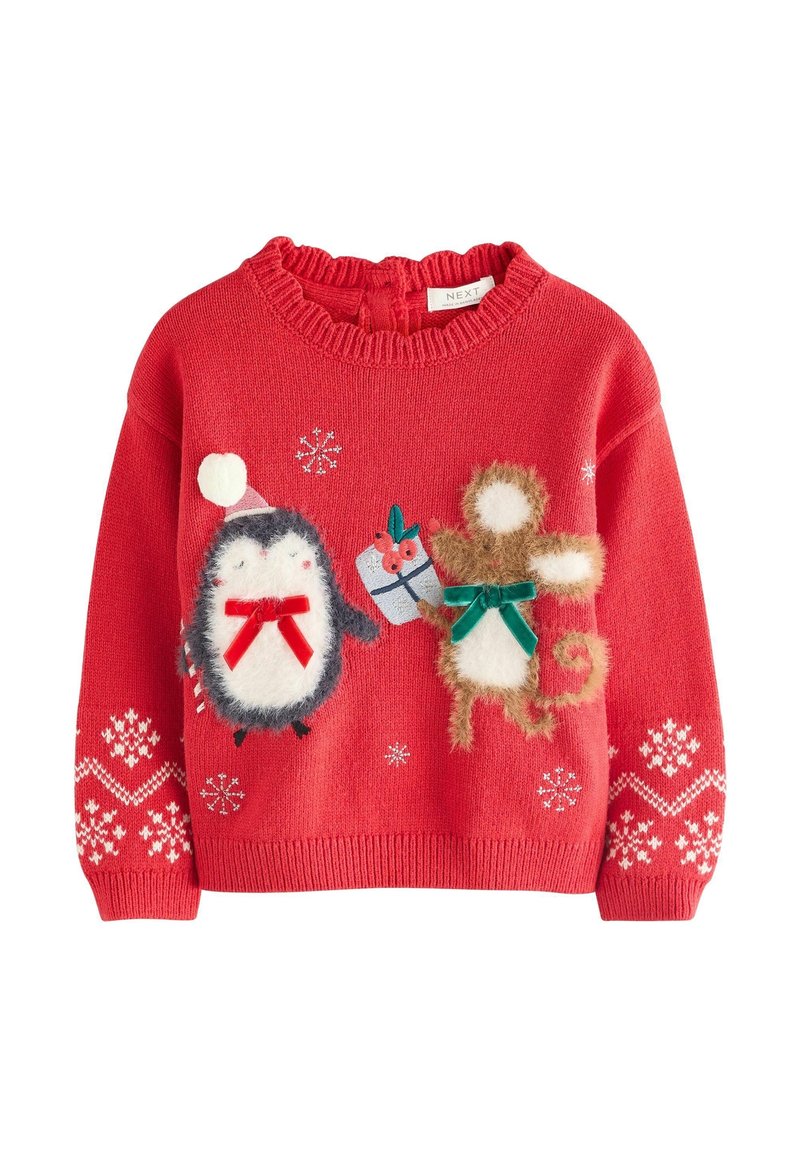 Pull rouge pour enfants avec un pingouin portant un chapeau de Père Noël et un singe tenant un cadeau, décoré de flocons de neige blancs et de motifs.