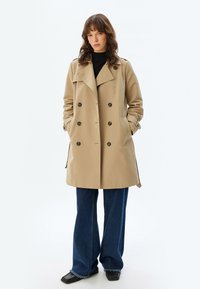 BELTED - Trenchcoat - beige