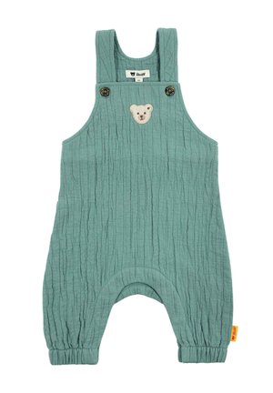 Green textured baby romper with shoulder straps, button closures, bear patch on chest, and elasticized cuffs at ankles.