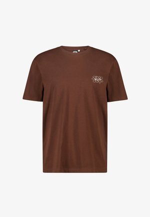 Bruin T-shirt met korte mouwen, ronde hals en klein minimalistisch wit bloemdessin op de linkerborst.