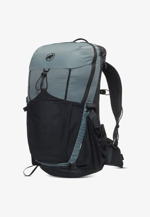 Backpack with a light blue and black design, textured surface, adjustable straps, and multiple pockets, including a mesh side pocket.