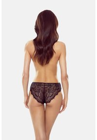 Schwarze Spitzenunterwäsche mit gewellten Kanten, verziert mit floralen Mustern und einer semi-transparenten Textur, entworfen mit einem mittelhohen Schnitt.