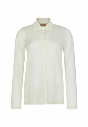 Cardigan bianco a maniche lunghe con bottoni e colletto, realizzato in tessuto leggero, mostrato su uno sfondo semplice.
