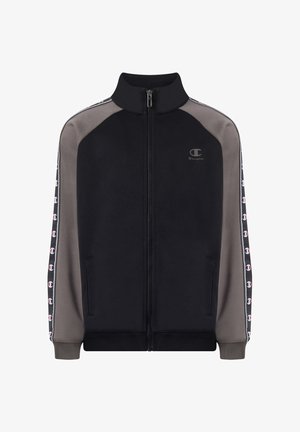 Zwart-grijs sportjack met rits, hoge kraag en patroon aan de zijkanten met kleine logo's op de mouwen en borst.