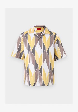 Κοντομάνικο πουκάμισο με κουμπιά και μυτερό γιακά, με γεωμετρικό σχέδιο σε κίτρινες, καφέ, γκρι και λευκές αποχρώσεις.