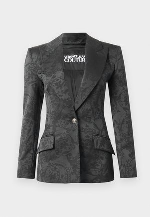 Juodas švarkas su žakardo raštu, vieno mygtuko užsegimas, dideli atlapai, dvi priekinės kišenės ir ženklinimas viduje. Lygi tekstūra.