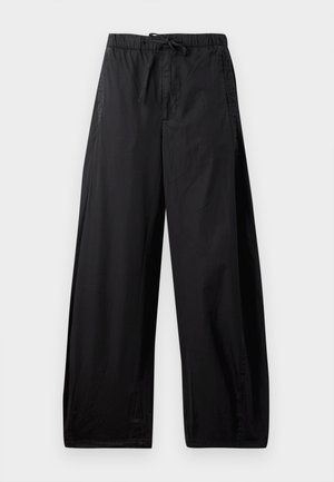 Black, lightweight, elastic-waist pants with a drawstring, featuring a loose fit and smooth texture. No visible patterns or hardware.