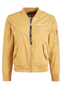 Veste bombardier jaune avec fermeture éclair à l'avant, deux poches latérales et une poche zippée supplémentaire sur la manche. Équipée de poignets et d'un col côtelés.
