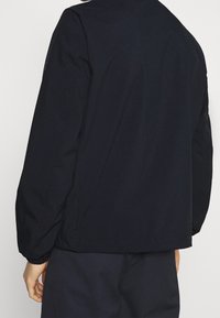 Tommy Hilfiger Giacca leggera - dark blue