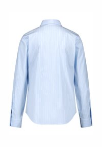 Light blue shirt with vertical white stripes, long sleeves, classic collar, and curved hem. Smooth fabric, cuffs feature a button detail.