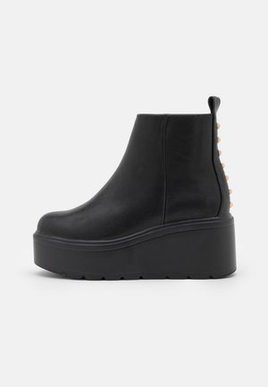 Platform ankle boots - black